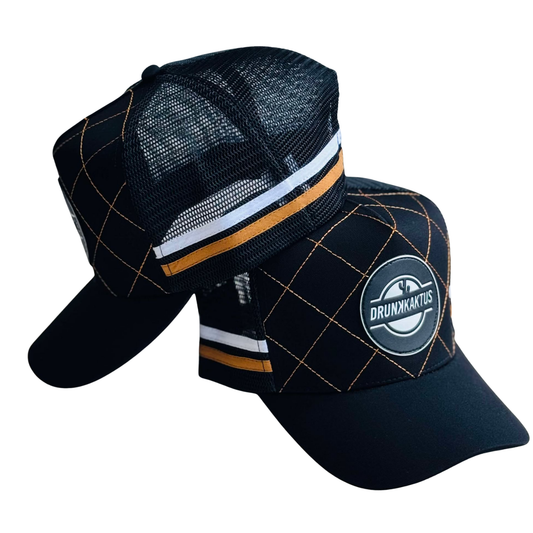 Black cap with plaid pattern and 'Drunkkats' logo on a white background