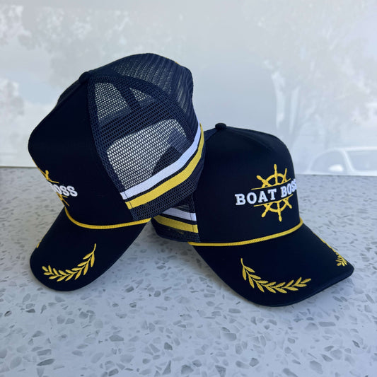 Description: Elevate your style with the Boat Boss - High Profile Trucker Cap. Features a structured cotton twill front, breathable mesh, and an adjustable 59cm snapback
