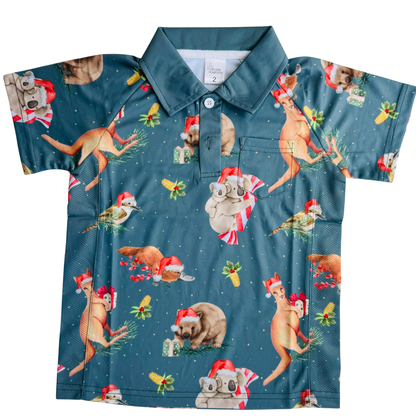 Sun Shirt Aussie Christmas kids' button-collar shirt with festive Australian animal pattern on a blue background.