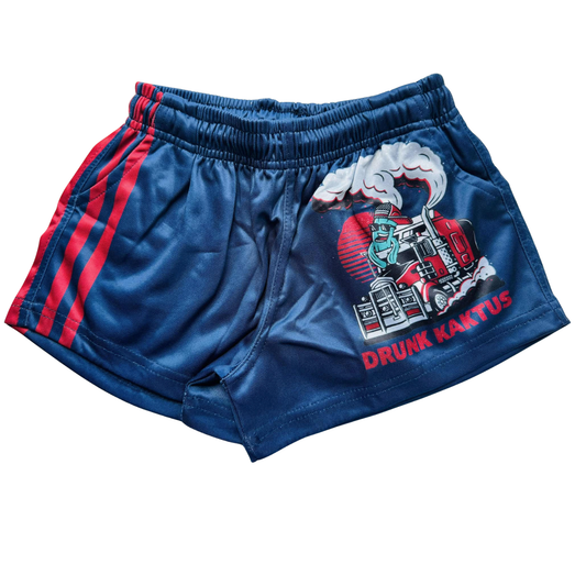 Close-up view of Kids Footy Shorts KARLOS, showing elastic waistband, drawstring, and deep pockets made from lightweight sublimated polyester fabric.