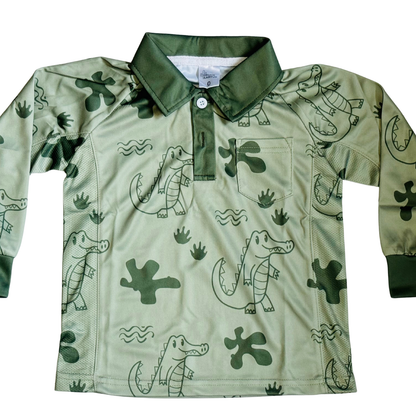Green shirt with alligator pattern on a white background