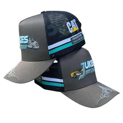 Two gray and black caps with branding on a white background