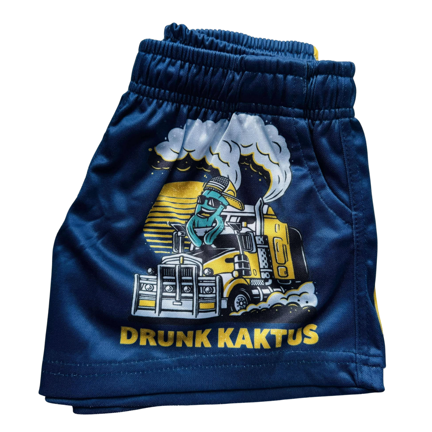 Side view of Kids Footy Shorts KARLOS, showing elastic waistband, drawstring, and deep pockets made from lightweight sublimated polyester fabric.